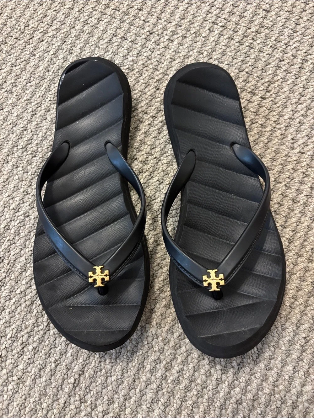 Tory Burch Black Flip Flops with Gold Logo Accent